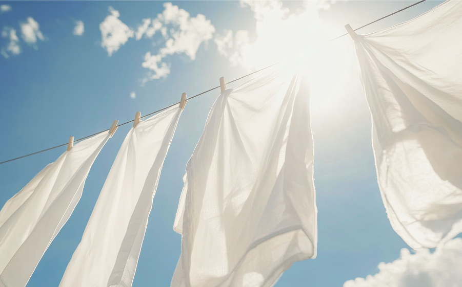 Laundry stripping white sheets
